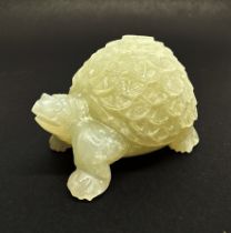 A Chinese carved jade figure of a tortoise, L. 6cm.