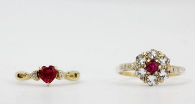 A 9ct yellow gold ring set with a red stone and diamond shoulders, (L.5), together with a 9ct gold