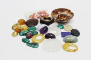 A collection of polished semi-precious stones.