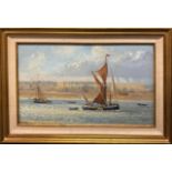 Colin Moore (Scottish b. 1949): A framed oil on canvas of Thames barge in the Raye at low tide