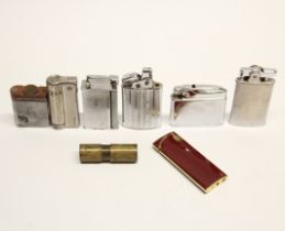 A group of vintage lighters.