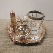 A group of silver plated items.