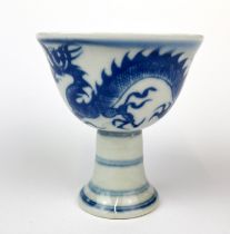 A Chinese hand-painted porcelain stem cup, H. 8.5cm.