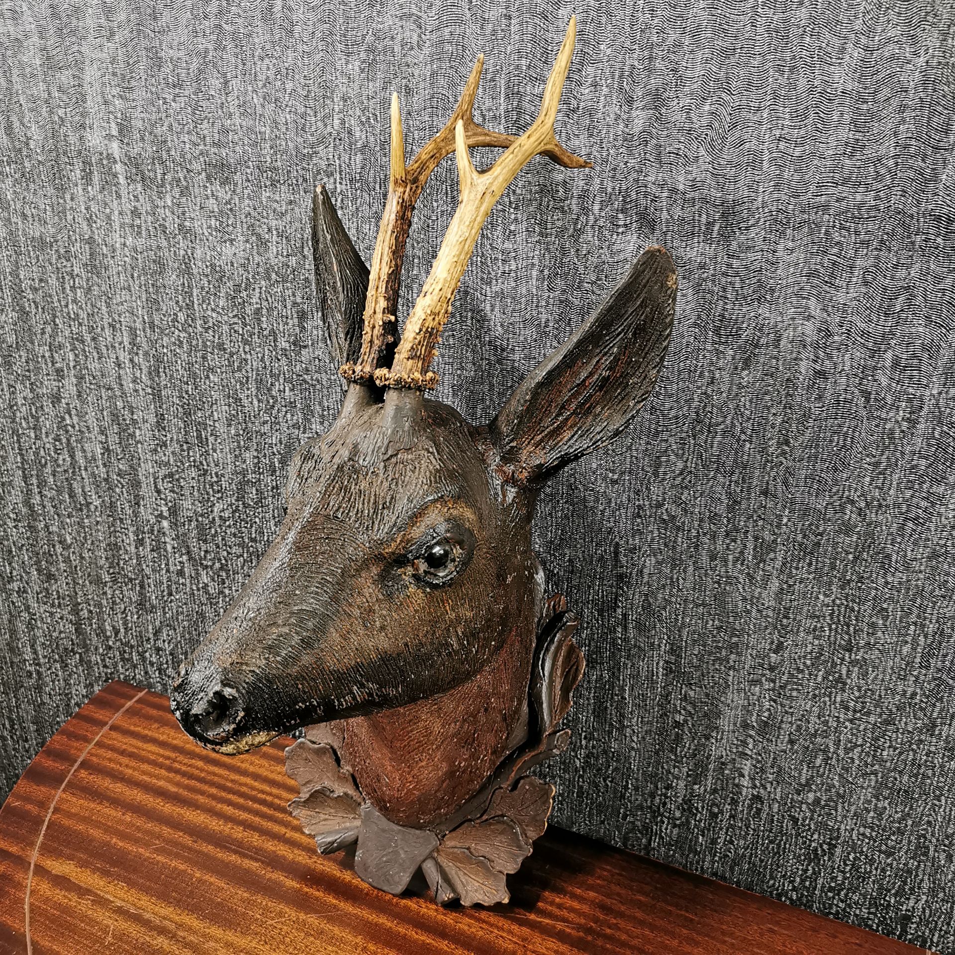 A large 19th C. Black Forest carved wooden deer head with real antlers, H. 54cm. - Image 2 of 5