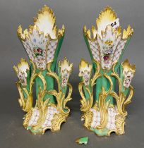 A pair of 19th C. French hand-painted porcelain vases, H. 28cm. (One repaired and with piece