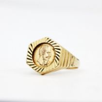 A hallmarked 9ct yellow gold coin style signet ring, (P).