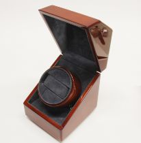An automatic watch winder.