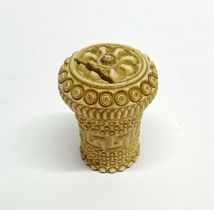 A 19th C. Japanese carved bone money box with screw thread lid, H. 6cm.