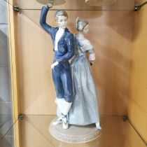 A large Nao porcelain figure of a couple dancing, H. 40cm.