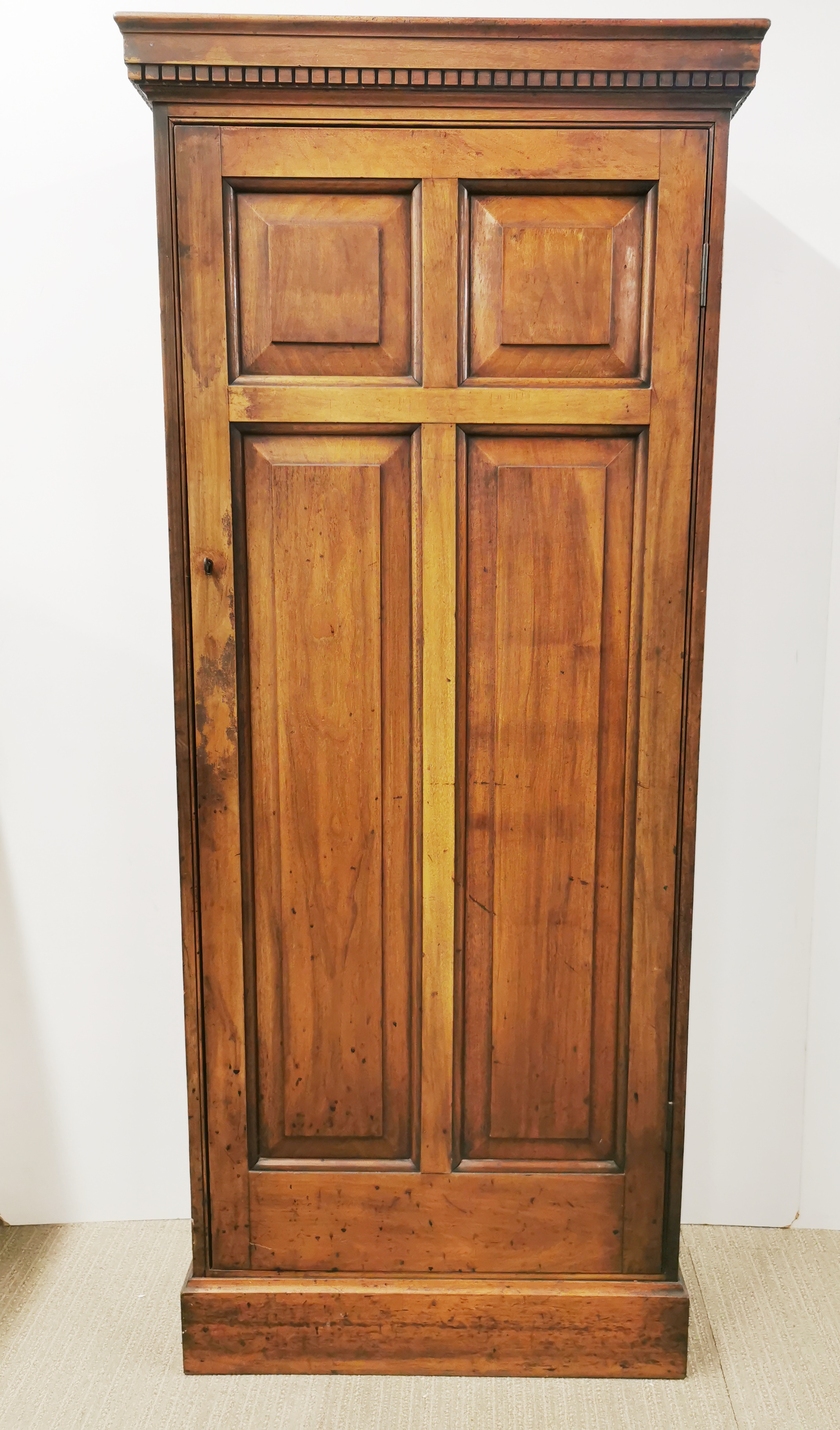 A five shelf walnut kitchen cupboard with carved geometrical border, 158 x 67 x 33cm.