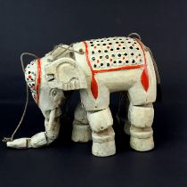 A mid-20th C. Indian carved wooden elephant puppet, H. 17cm.