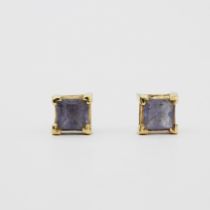 A pair of 14ct yellow gold tanzanite set stud earrings, L. 0.4cm. Butterflies are missing.