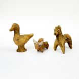 Antiquities interest: Three early pottery animal figures and one partial female figure, tallest