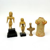 Antiquities interest: A group of three early Middle Eastern ceramic figures, tallest with stand