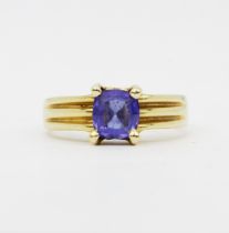 A 14ct yellow gold (marked 14K) tanzanite set solitaire ring, (M.5).