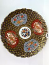 A Japanese Imari style porcelain charger, Dia 39cm.