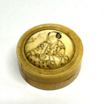 A 19th C. Japanese carved bone miniature box with screw thread lid, Dia. 3cm.