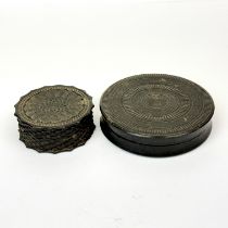 Two 19th C. turned bog oak circular boxes, largest 8cm.
