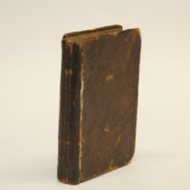 An early leather bound volume of Moliere plays c. 1660, volume size 8 x 13 x 2.5cm.