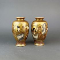 A pair of 19th C. Japanese Kutani vases, decorated with images of immortals, H.22cm