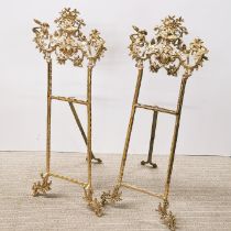 A pair of large gilt brass picture easels, H. 78cm.