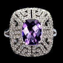 A 925 silver ring set with oval cut amethyst and white stones, (N.5).