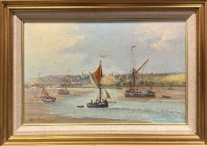 Colin Moore (British b. 1949): A framed 1990's oil on canvas of Thames barges off Leigh-on-Sea,