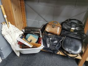 A quantity of vintage leather handbags with purses etc.