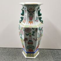 A mid 20thC hexagonal Chinese hand-painted porcelain vase, H. 43cm.