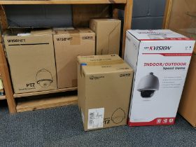 A group of five HIK Vision and Hanwha security cameras.