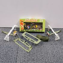 A boxed Striker football game.