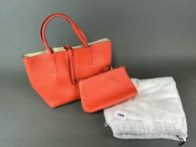 A Portafino Italian leather grab bag in orange by Osprey of London incorporating crossbody pouch