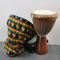 A bongo drum and case, H. 60cm.