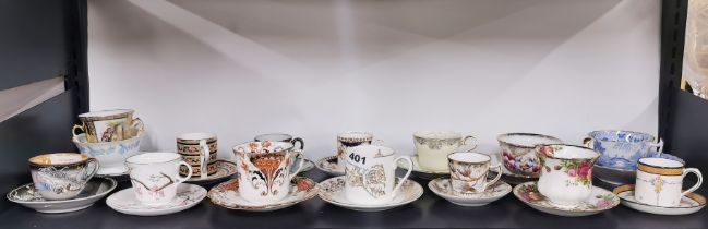 A group of collectable tea and coffee cups with saucers.