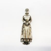 A heavy white metal (tested silver) figure of Florence Nightingale.