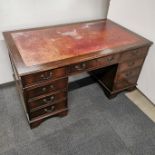 A mahogany eight drawer leather topped, knee hole desk, 155 x 90 x 77cm.