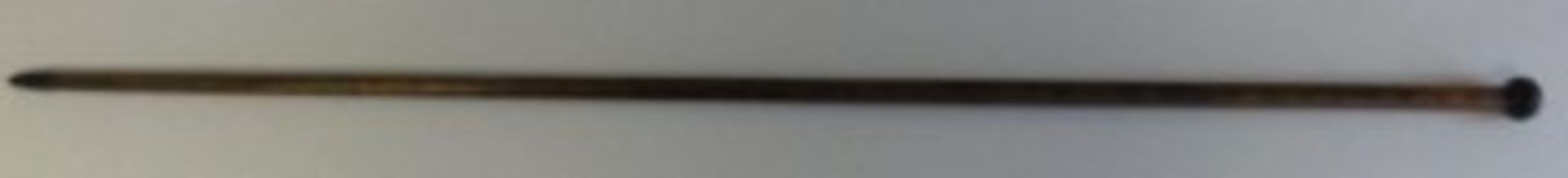 Measuring Stick. At first this cane appears just that—a 43”long dark wood cane with a small circular