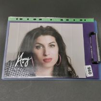 Autograph interest. A signed photograph of Amy Winehouse with certificate.