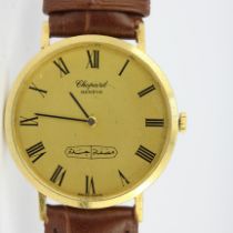 A boxed gentleman's 18ct yellow gold Chopard mechanical wrist watch on a leather strap. In a Chopard