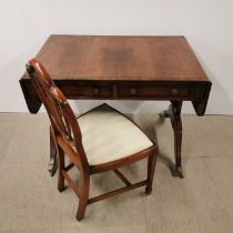 A drop leaf, two drawer inlaid mahogany desk with a cream upholstered chair, desk extended 150 x