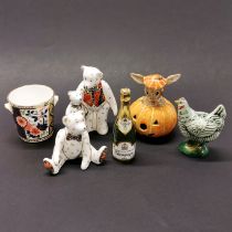 Two Royal Crown Derby bear figures with a Derby miniature ice bucket, a Doulton halloween Bunnykins,