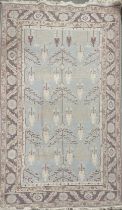 A hand woven pastel ground wool rug, 280 x 187cm.