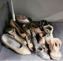 A collection of metal and other shoes.