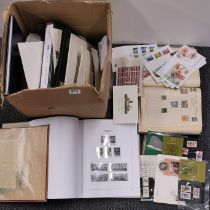 A large quantity of mixed stamps and albums.