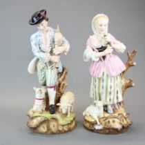 A pair of large continental porcelain figurines, H. 42cm.
