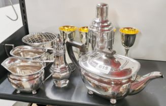 A silver plated tea set and other items.