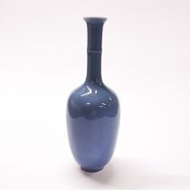 A small Chinese pale blue glazed porcelain vase, H. 17cm.