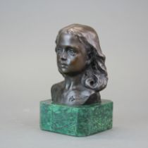 A small bronze bust of a girl, H. 15cm.