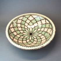 A North African style hand painted pottery bowl, Dia. 41cm.