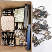 A box of mixed silver plate and cutlery.